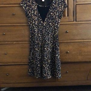 Leopard print dress with transparent black V in front and back, size XS